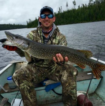 Man holding Large Pike caught at Big Canon Lake Lodge