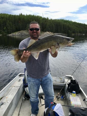 Man holding Walleye caught at Big Canon Lake Lodge