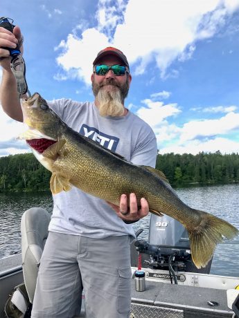 Man holding Walleye caught at Big Canon Lake Lodge