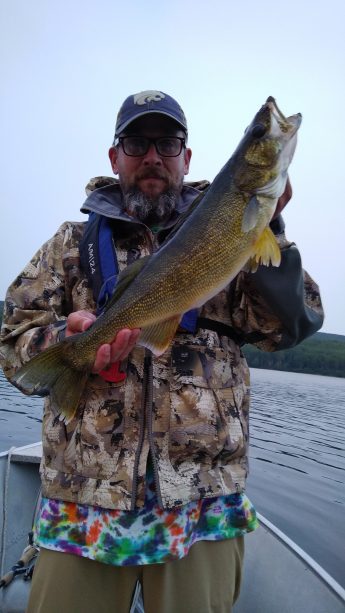 Man holding Walleye Caught at Big Canon Lake Lodge
